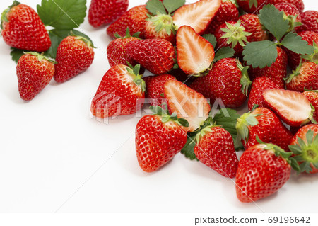 Lots of strawberries, strawberries and strawberries 69196642