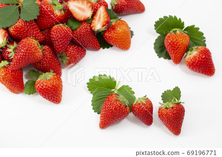 Lots of strawberries, strawberries and strawberries 69196771