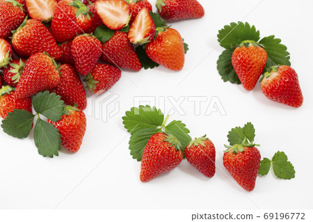 Lots of strawberries, strawberries and strawberries 69196772