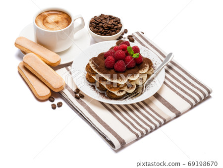 portion of Classic tiramisu dessert with raspberries and cup of fresh hot espresso isolated on white background - clipping path portion of Classic tiramisu dessert with raspberries and cup of fresh hot espresso isolated on white background - clipping path 69198670