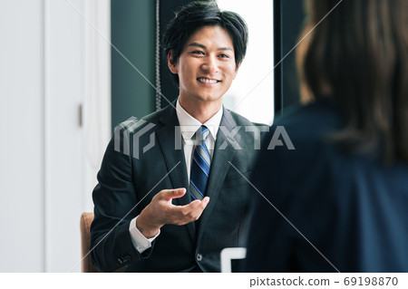 Businessman talking with customer in business talk 69198870