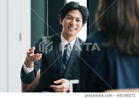 Businessman talking with customer in business talk Businessman talking with customer in business talk 69198871