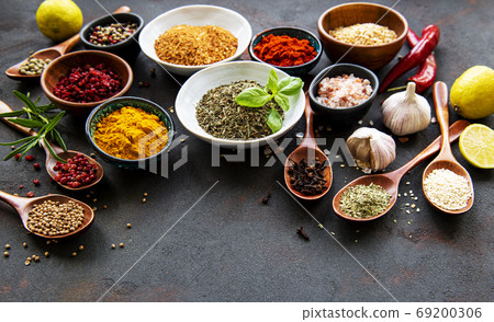 Various spices on a black background 69200306