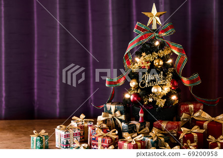 Christmas tree and many Christmas gifts 69200958