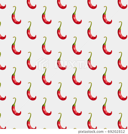 Red hot chilli pepper on a light background Red hot chilli pepper on a light background 69202812