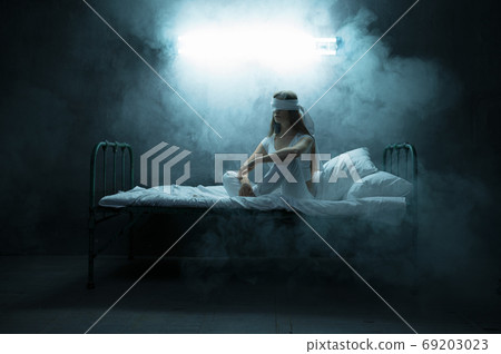 Blindfolded psycho woman in bed, psychedelic 69203023