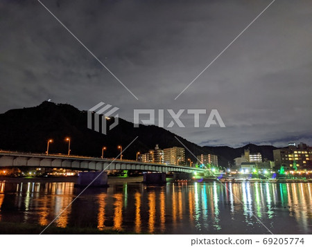 Mt. Kinka and Nagara River (Ukai ferris boat moving to the surface of water, Gifu Prefecture, Gifu City) Mt. Kinka and Nagara River (Ukai ferris boat moving to the surface of water, Gifu Prefecture, Gifu City) 69205774