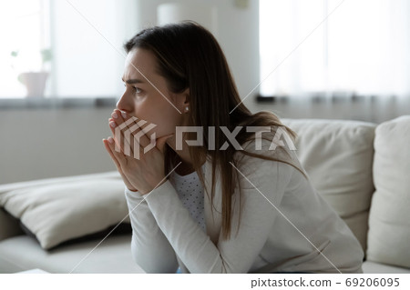 Worried young woman feeling stressed of difficult life situation. Worried young woman feeling stressed of difficult life situation. 69206095
