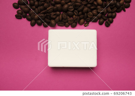 Handmade coffee scented soap on bright background Handmade coffee scented soap on bright background 69206743