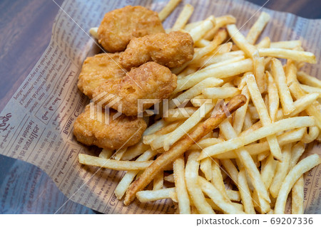 Chicken nuggets and fries Chicken nuggets and fries 69207336