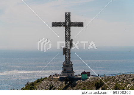 Russia. Krasnodar region. High 43-meter Orthodox cross on the Markhotsky ridge with a view of The Gelendzhik Bay. 69208263