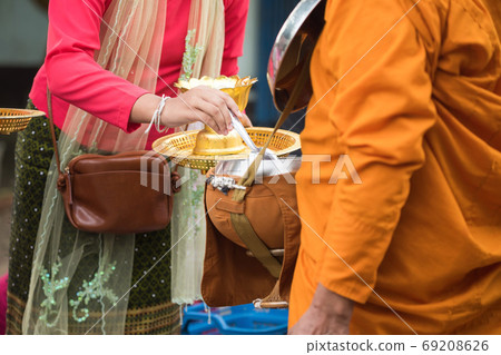 offer food into Thai Monk begging bowl offer food into Thai Monk begging bowl 69208626