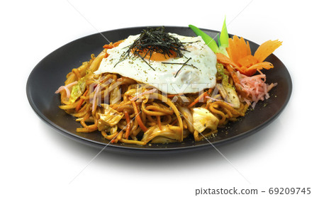 Yakisoba ontop Fried Egg is a classic Japanese stir fried noodle Yakisoba ontop Fried Egg is a classic Japanese stir fried noodle 69209745