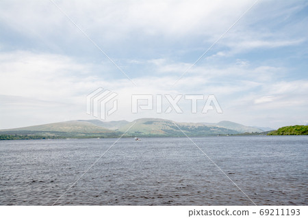 Lakes in the suburbs of Edinburgh and mountains in the distance Lakes in the suburbs of Edinburgh and mountains in the distance 69211193