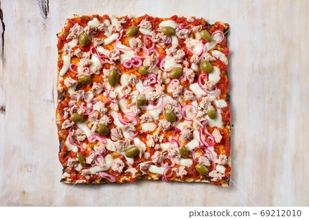 Delicious traditional Tarte Flambee from the Alsatian region of France with a thin crust of dough, tuna 69212010