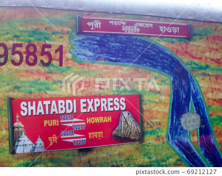 Nameplate on the Coach of Puri Howrah Shatabdi Express of East Coast Indian Railway zone. Nameplate on the Coach of Puri Howrah Shatabdi Express of East Coast Indian Railway zone. 69212127