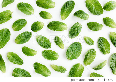 Mint leaves isolated on white background. Set of peppermint. Mint Pattern. Flat lay. Top view. Mint leaves isolated on white background. Set of peppermint. Mint Pattern. Flat lay. Top view. 69212329
