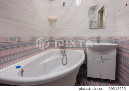 The interior of an ordinary habitable bathroom in the interior of a hotel room The interior of an ordinary habitable bathroom in the interior of a hotel room 69212653