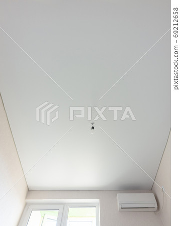 Matte vinyl stretch ceiling in the interior of the room 69212658
