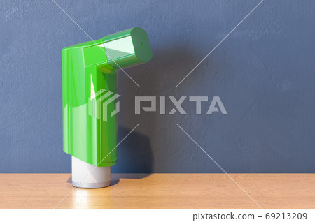 Green inhaler on the wooden table. 3D rendering 69213209