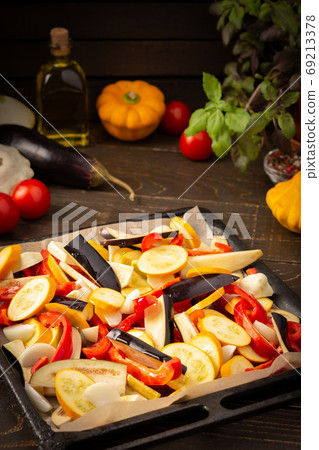 Fresh vegetables on a baking sheet 69213378