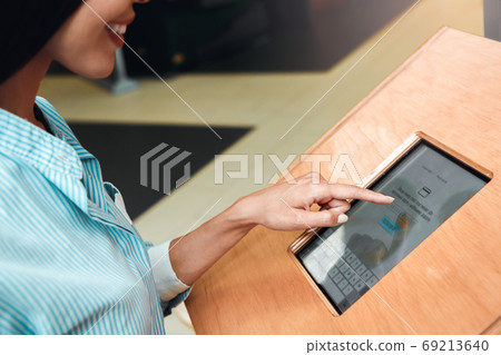 Young man going out to the cinema 69213640