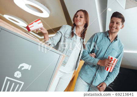 Young people friends together in the cinema 69213641