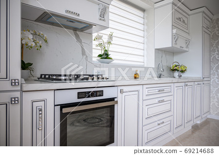 Luxury modern classic white kitchen interior Luxury modern classic white kitchen interior 69214688