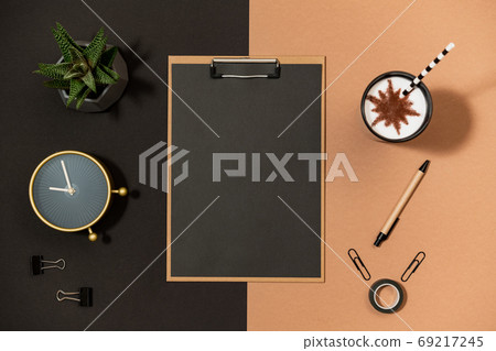 Mockup paper clipboard on office table top view 69217245