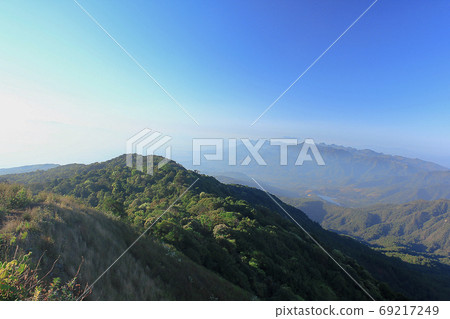 Landscape mist-covered mountains in the morning. 69217249