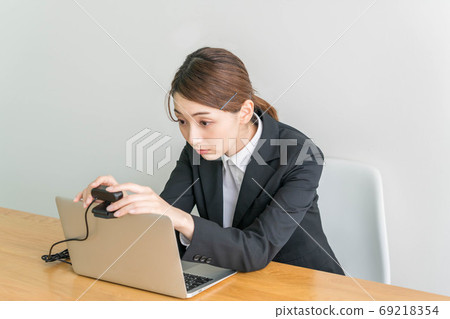 Young woman preparing for an online interview Young woman preparing for an online interview 69218354