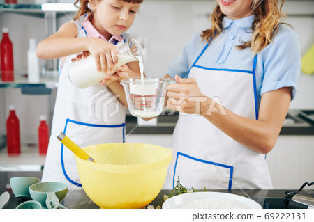 Adding milk in dough 69222131