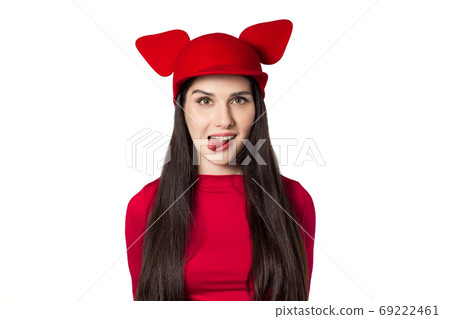 Playful white black haired beautiful young woman with mouse ears hat 69222461