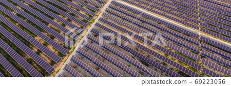 Aerial view of the solar panel in solar farm for green energy BANNER, LONG FORMAT 69223056