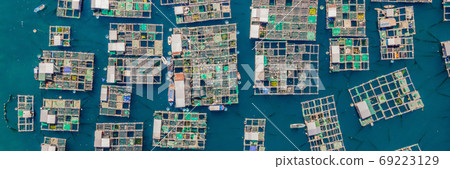 Lots of marine farms in a blue sea water. Sea farming concept BANNER, LONG FORMAT Lots of marine farms in a blue sea water. Sea farming concept BANNER, LONG FORMAT 69223129