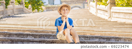 Boy tourist in Chua Linh Ung Bai But Temple, Lady Buddha Temple in Da Nang, Vietnam. Traveling with children concept BANNER, LONG FORMAT Boy tourist in Chua Linh Ung Bai But Temple, Lady Buddha Temple in Da Nang, Vietnam. Traveling with children concept BANNER, LONG FORMAT 69223474