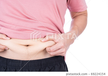 Fat man holding excessive fat belly, overweight fatty belly isolated on over white background. Fat man holding excessive fat belly, overweight fatty belly isolated on over white background. 69224154