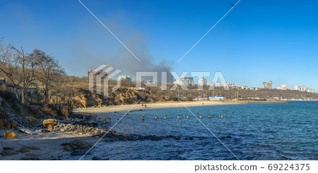 View from the sea to the big fire in Odessa, Ukraine View from the sea to the big fire in Odessa, Ukraine 69224375