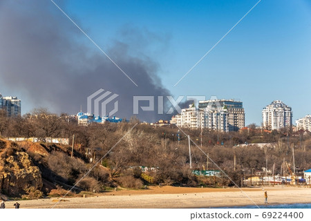 View from the sea to the big fire in Odessa, Ukraine View from the sea to the big fire in Odessa, Ukraine 69224400