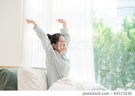 A refreshing morning, a sleeping woman A refreshing morning, a sleeping woman 69225836