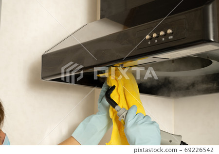 Ventilation fan cleaning with steam cleaner Ventilation fan cleaning with steam cleaner 69226542