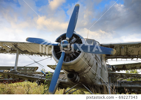 Abandoned and destroyed planes are in the field Abandoned and destroyed planes are in the field 69227343