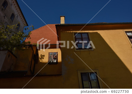 Sunlight Fusho Fusako Red-colored rooftop Japanese-colored tiles on the wall. Sunlight Fusho Fusako Red-colored rooftop Japanese-colored tiles on the wall. 69227730