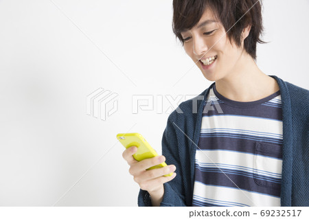 Men looking at mobile mail 69232517