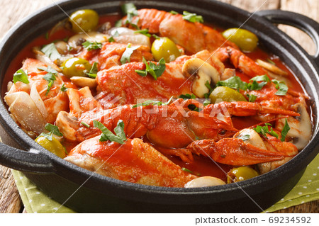 Chicken Marengo cooked with crayfish, mushrooms, olives and shal 69234592