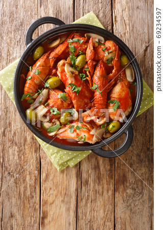 Chicken Marengo is a French dish is served with a crawfish close 69234597