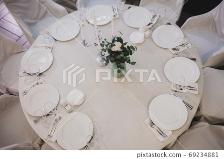 Luxury table settings for fine dining 69234881