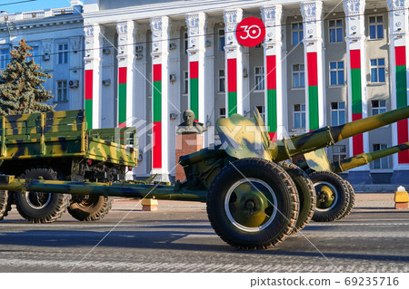 military parade in the city, ordered military equipment, tanks, guns and other weapons in the street for celebration 69235716