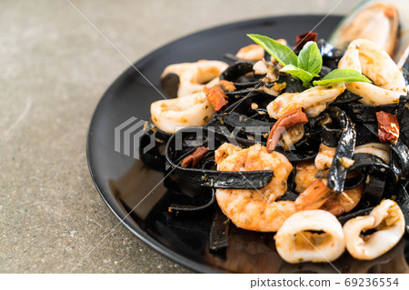 black spaghetti or pasta with seafood black spaghetti or pasta with seafood 69236554