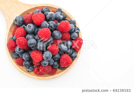 fresh blueberry and rasberry on white fresh blueberry and rasberry on white 69236583